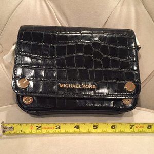 Michael Kohrs leather clutch with shoulder strap